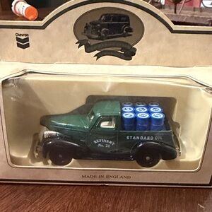 Chevron Diecast Model Truck with Blue Barrels. Rpm